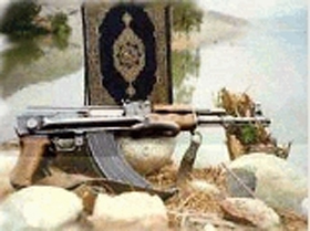 Коран и автомат. Фото с сайта Кавказ-Центр".