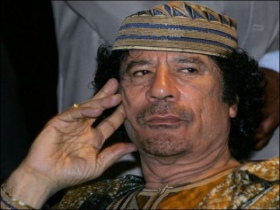 Муамар Каддафи. Фото с сайта ww.desourcesure.com